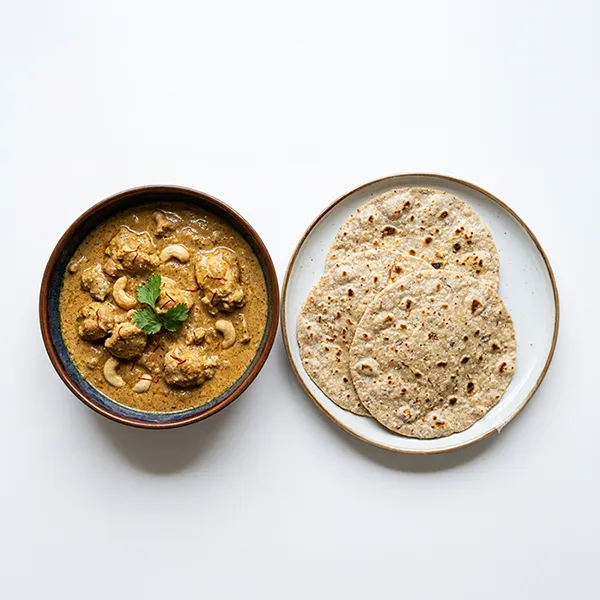 Lucknowi Cashew Murgh Korma With Almond Roti